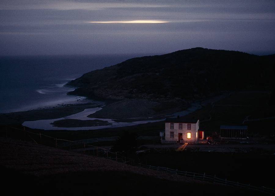 A solitary fisherman’s home keeps watch on quiet Placentia Bay in Newfoundland, Canada, 1974