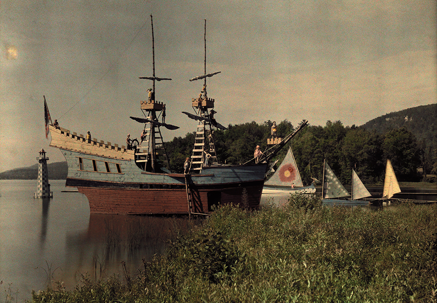 A view of ships and canoes docked in the harbor for summer camp fun at the Lanakila Camp for Boys in Vermont, 1927