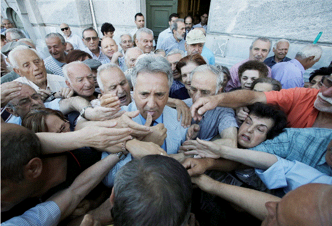 Customers being handed priority stickers outside a bank