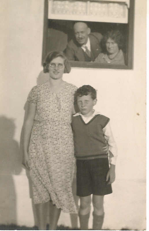 Daisy McCleland with Mr Clements in window with Bryce & Thelma McCleland standing outside