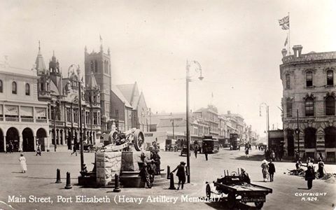 main-street-showing-the-heavy-artillery-memorial-coal-firewood-truck-workers-digging-up-the-road-trams-british-flag