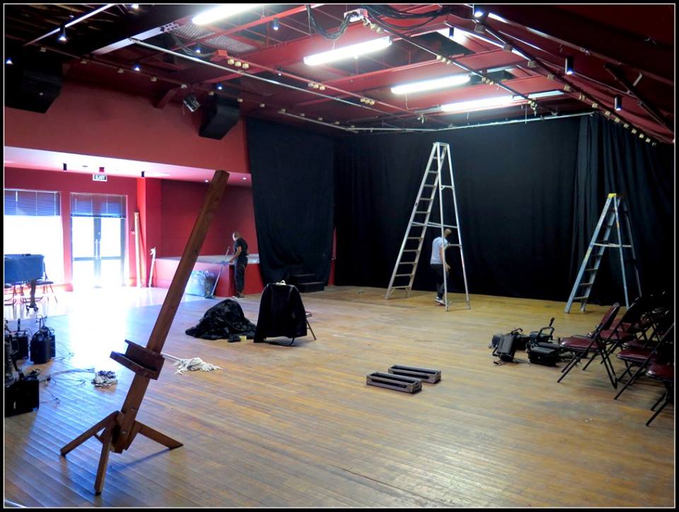 The Barn Theatre with staff busy preparing the space for the next production